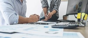 Finance manager presenting and discussing company growth project